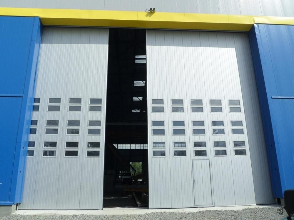 Поворотно-подвесные секционные ворота Ryterna.